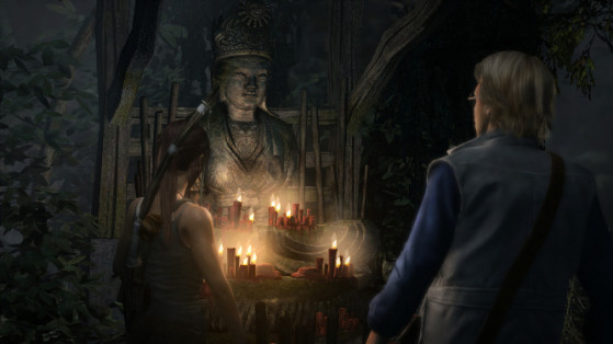 Lara et le compagnon pénible de service découvrent que les habitants du coin produisent assez de bougies et d'huile pour illuminer l'intégralité de l'île toute les nuits. - Tomb Raider
